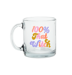 Clear glass mug with text that reads "100% That Witch" in multicolor font on front of mug