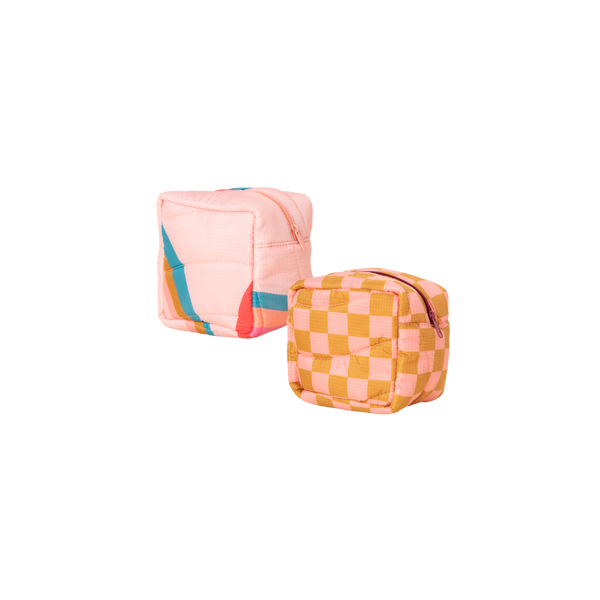 Two puffy pouches with zippers. One in light pink and bold curvy lines, another pink and beige/mustard checkered.