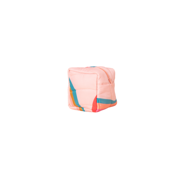 A puffy pouch in pink with red, pink, teal, and orange lines