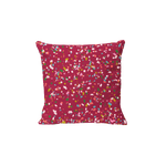Red holiday pillow with confetti 