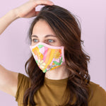 A brunette woman wears a face mask in talking out of turn's in the groove pattern