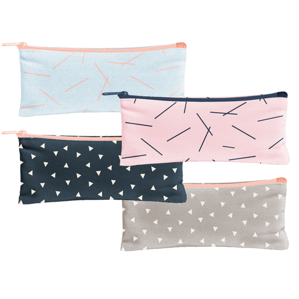 Canvas Pencil Pouch in blush pink with navy pixie sticks, gray with white triangles, navy with white triangles and beach wash denim with peach pixie sticks.