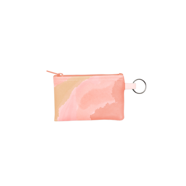 Daydream Penny Key Ring is a coin purse key ring in peach and pink cloud pattern.