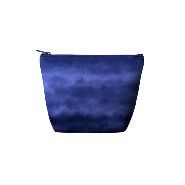 An indigo blue colored pouch that also has lighter blue marks. Shape of pouch is trapezoid-like.