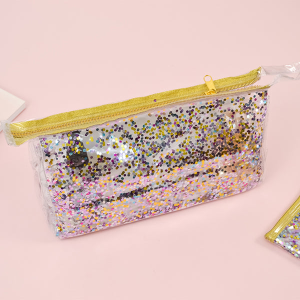 Travel cosmetics pouch in clear vinyl with glitter confetti in small.