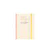 Cream planner with peach binding and yellow elastic closure featuring each day of the week printed in a different color.
