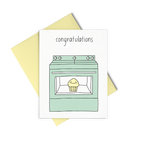 Baby cards that reads Congratulations and showing a mint green oven that has a little yellow muffin inside. 