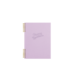 A purple notebook with the phrase "Reading is Fundamental" printed on the front cover with dark purple lettering.