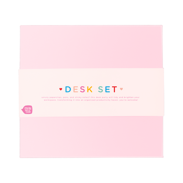 Top view of a closed pink box with a cute packaging band wrapped around the middle.
