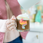 a girl holding a cute glass mug that says so fucking over it in colorful letters