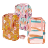 Three colorful vegan leather backpacks next to each other. one orange with floral pattern, one a floral collage, and the last with pastel stripes. 