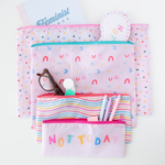 set of four ripstop pouches in pink with colorful prints to carry pens, glasses, notebooks