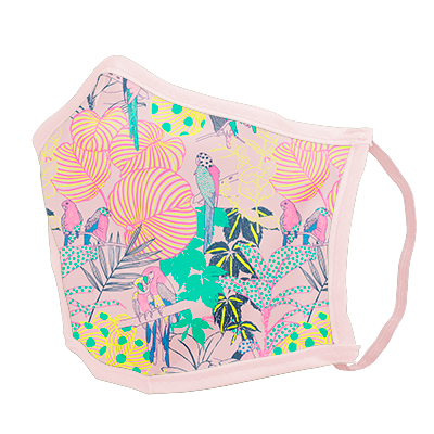 A pink facemask with a multi-colored tropical scene on it. 