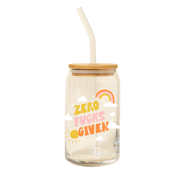 A 16 oz can glass with glass straw. "ZERO FUCKS GIVEN" is printed on the front in multi-color font; illustrations of a cloud, rainbow, and sun surround the text.