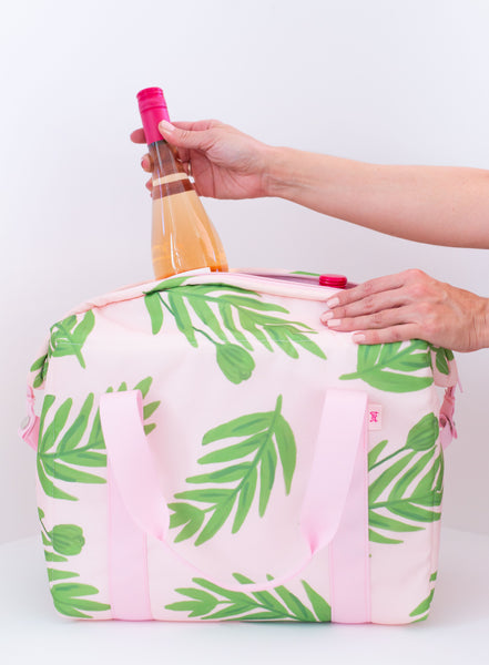Buds cooler bag with wine bottle being held 
