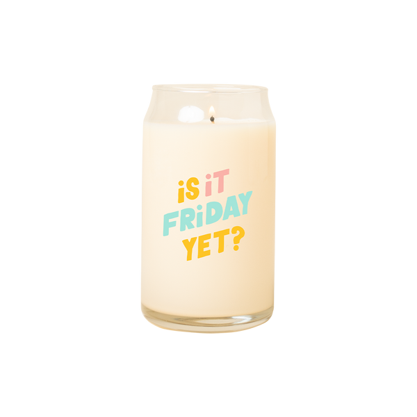 A 16 oz. candle with "Is it Friday?" printed on in multicolored lettering.