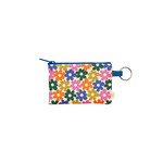 Colorful floral print zippered pouch with key ring and dark blue zipper, featuring multicolored flowers. 