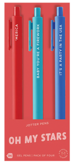 A set of three jotter pens on red packaging labeled “OH MY STARS.” The red pen says “‘MERICA,” the teal pen reads “BABY YOU’RE A FIREWORK,” and the royal blue pen says “IT’S A PARTY IN THE USA.” The packaging indicates it's a gel pen pack of four, though only three pens are shown, with ink colors matching their barrels.