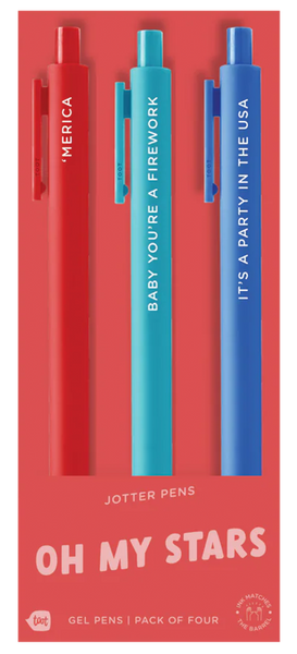 A set of three jotter pens on red packaging labeled “OH MY STARS.” The red pen says “‘MERICA,” the teal pen reads “BABY YOU’RE A FIREWORK,” and the royal blue pen says “IT’S A PARTY IN THE USA.” The packaging indicates it's a gel pen pack of four, though only three pens are shown, with ink colors matching their barrels.