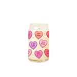Candy Heart-Themed Glass Candle
A lit candle in a clear glass jar features playful, pastel candy heart illustrations with cheeky phrases like “NOT TODAY,” “UGH AS IF,” and “SHE A BADDIE.” The hearts are pink, peach, and purple, set against a cream-colored wax background, evoking a fun and flirty Valentine’s Day vibe.