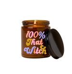 Halloween Candle amber jar with lid with saying "100% that witch" in shades of pink, purple and orange