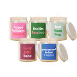 5 TOOT Holiday Candle Jars. Each different colors and phrases.