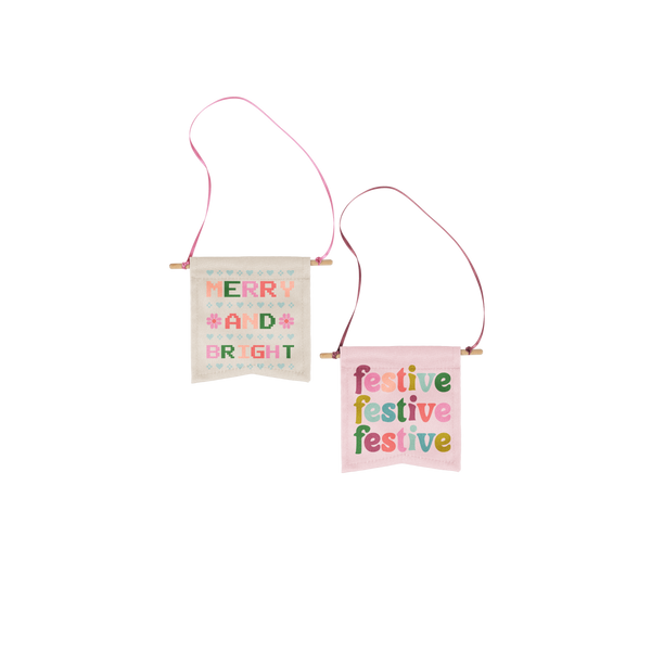 small banner with the phrase merry and bright in mulit-color type font with hearts between the words and a small flag with phrase festive festive festive in multi-color letters with pink background. 
