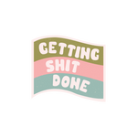 "Getting Shit Done" flag sticker in olive green, pink, and blue.