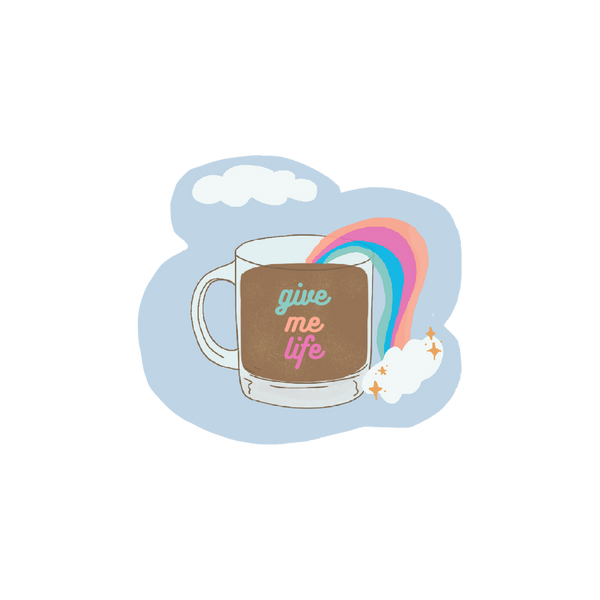 Coffee mug sticker with "give me life" on the from and a rainbow spewing out of the coffee mug and two rainbows surround it.