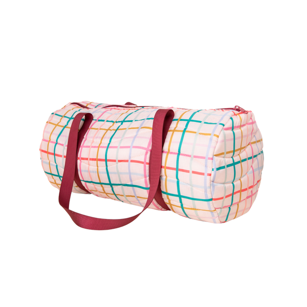 Puffy duffel bag with pink, red, yellow, green, and blue plaid pattern; maroon straps and zipper.
