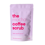 organic, vegan and cruelty-free the mocha coffee scrub with purple background. 