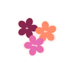 Three flower sticker in different color an a different word in each flower. The flowers are a deep magenta, coral, and pink the the phrase "do thing thing" on it.