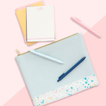 Powder blue pencil pouch with three jotter pens and a letter pressed stationery set of cards.