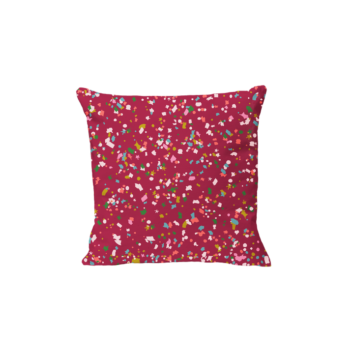 Red holiday pillow with confetti 