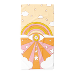 Orange sky with small stars and clouds, colorful rainbow and eye on the center with a daisy in the middle with orange/pink rays beach towel.