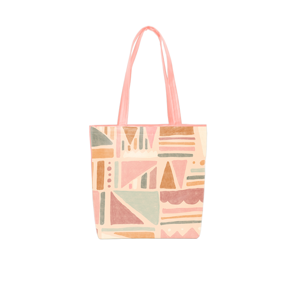 Cute tote bag with geometric fruit design and peach shoulder straps.