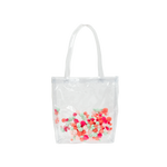 Cute tote bag in clear vinyl with colorful pom poms.