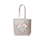 Grey canvas tote bag that has a pink heart and says regret nothing
