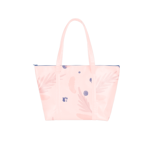 Cute travel bag in light pink with abstract floral pattern.