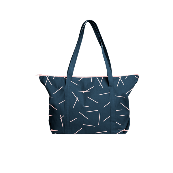 Cute tote bag in navy blue canvas with pixie stick pattern and double shoulder straps.