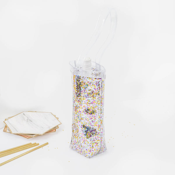 Clear vinyl wine tote bag with glitter confetti and a long vinyl strap across the top 