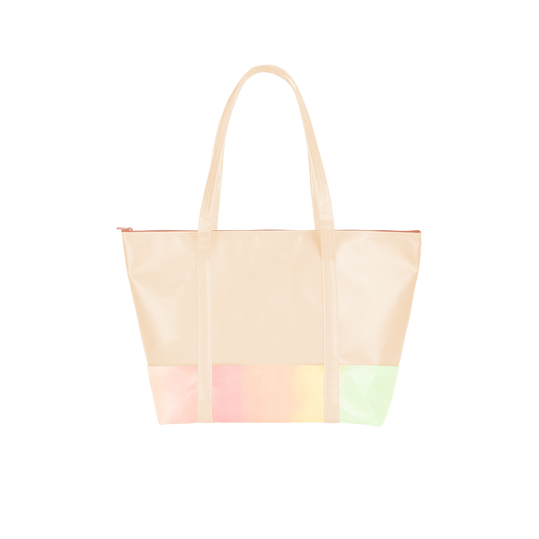 Cute travel bag in peach with pastel rainbow detail and zippered top.