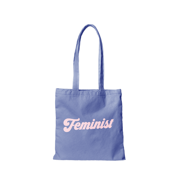 Medium blue canvas tote with light pink Feminist text