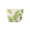 A blush pink pouch with green leaves and stems printed on.