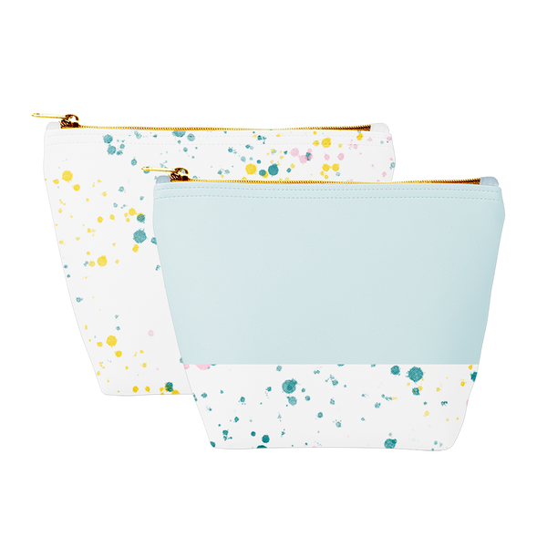 Two cute cosmetics bags; one white with paint splatter print and one powder blue with paint splatter trim and a zippered top.