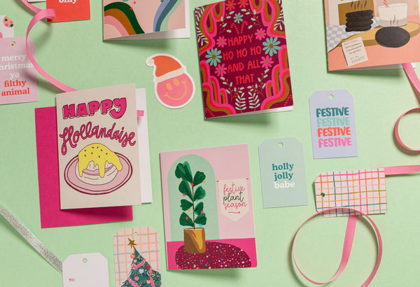 Layout of various holiday cards and gift tags