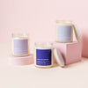 3 jar candles with lids displayed next to each other; Bans Off, Smoke and Mirrors, and Bang Trim.