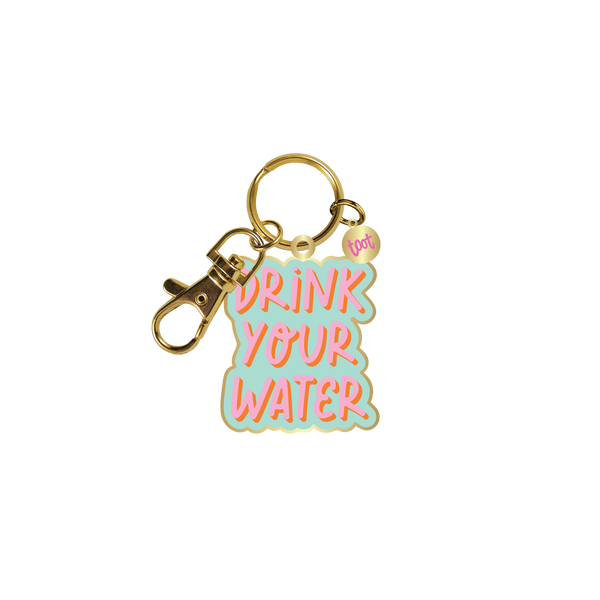 Gold key charm with light teal blue background with "Drink Your Water" in pink with a darker pink shadow.