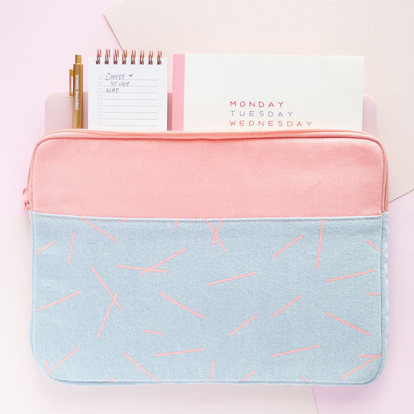Pixie Sticks Canvas Laptop Sleeve is a cute laptop sleeve in light denim with peach pixie sticks pattern in 13  inch size with a planner. task-pad, and jotter inside