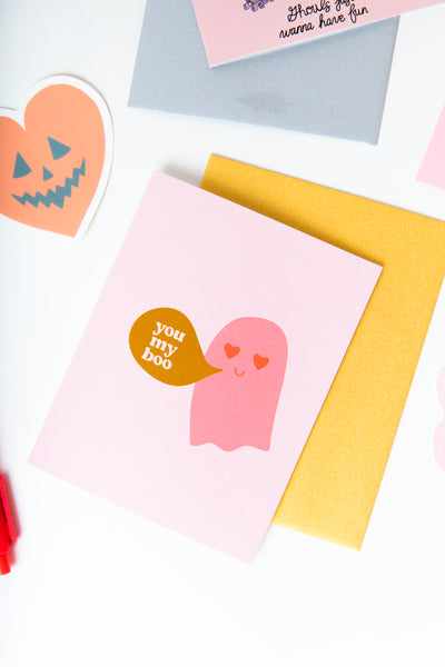 Halloween greeting card with pink ghost and word bubble saying "you my boo";